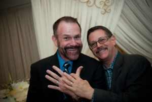 A newly wedded same-sex couple